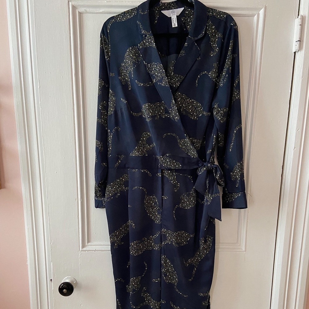 Brand new navy jumpsuit with abstract animal print